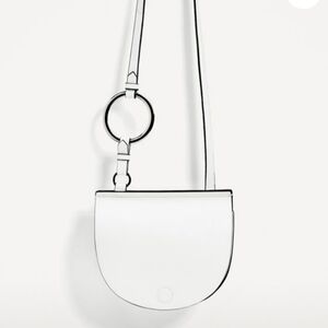 Zara white faux leather cross body purse. white with black and silver detail. VG